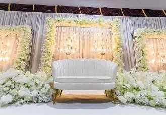 Sofa or head table: two ways to showcase the couple.